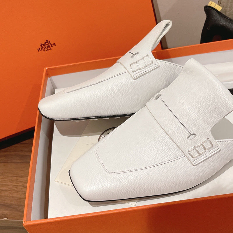 Hermès White High-Top Sneakers - Toe Detail View
