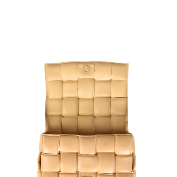Close-up of Bottega Veneta cross body bags hardware and fine stitching