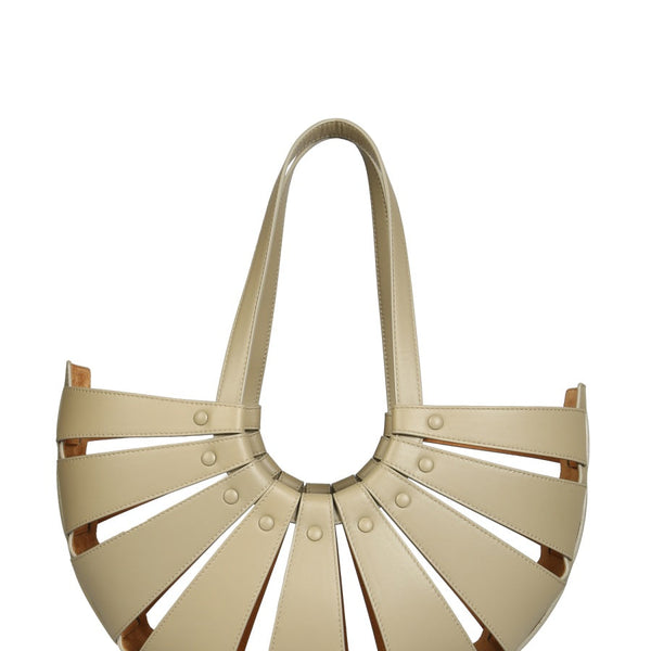 Close-up of Bottega Veneta shoulder bags hardware and fine stitching
