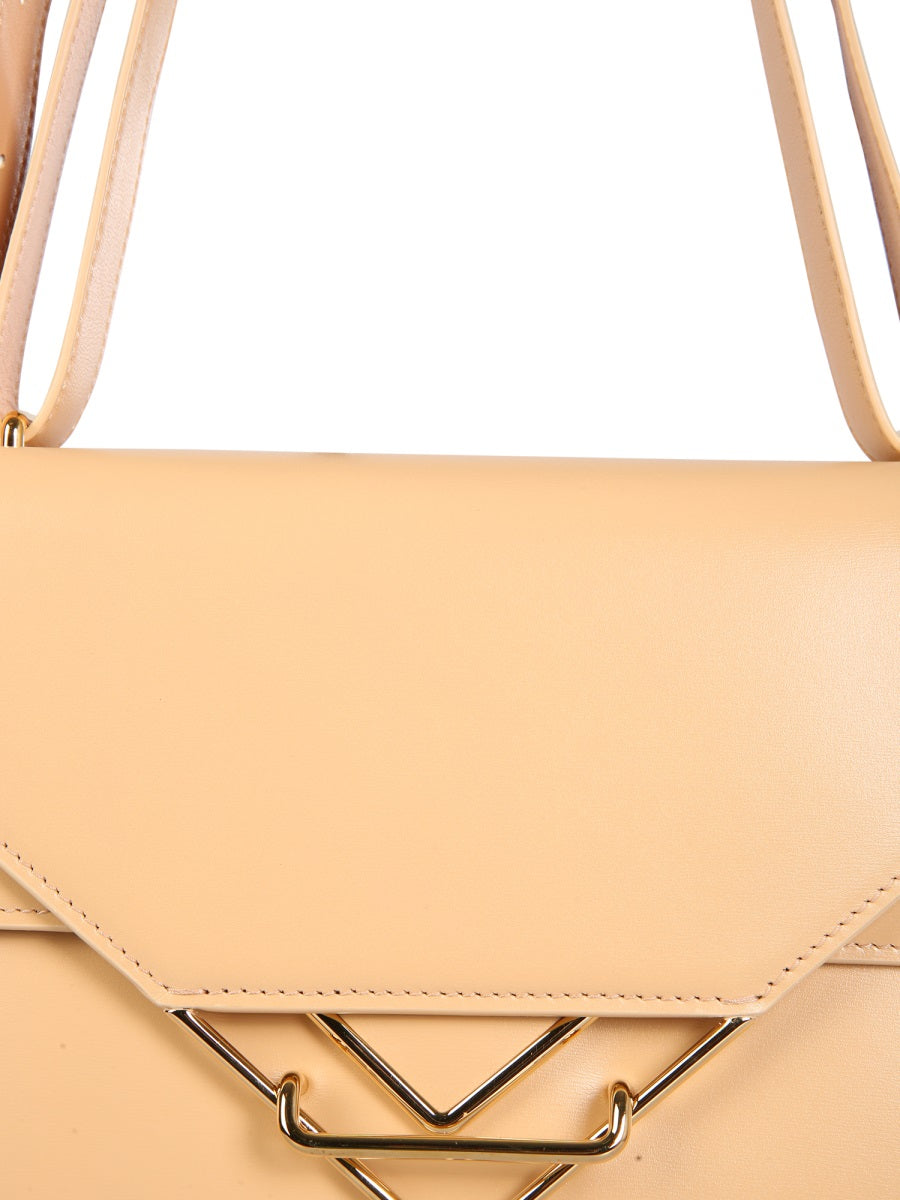 Close-up of Bottega Veneta cross body bags hardware and fine stitching