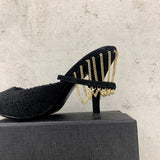 Front view of Saint Laurent luxury piece style No.021