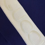 Close-up of Gucci Bomber Jacket signature hardware and stitching detail