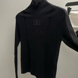Chanel Turtleneck – luxury designer piece at Velouxe