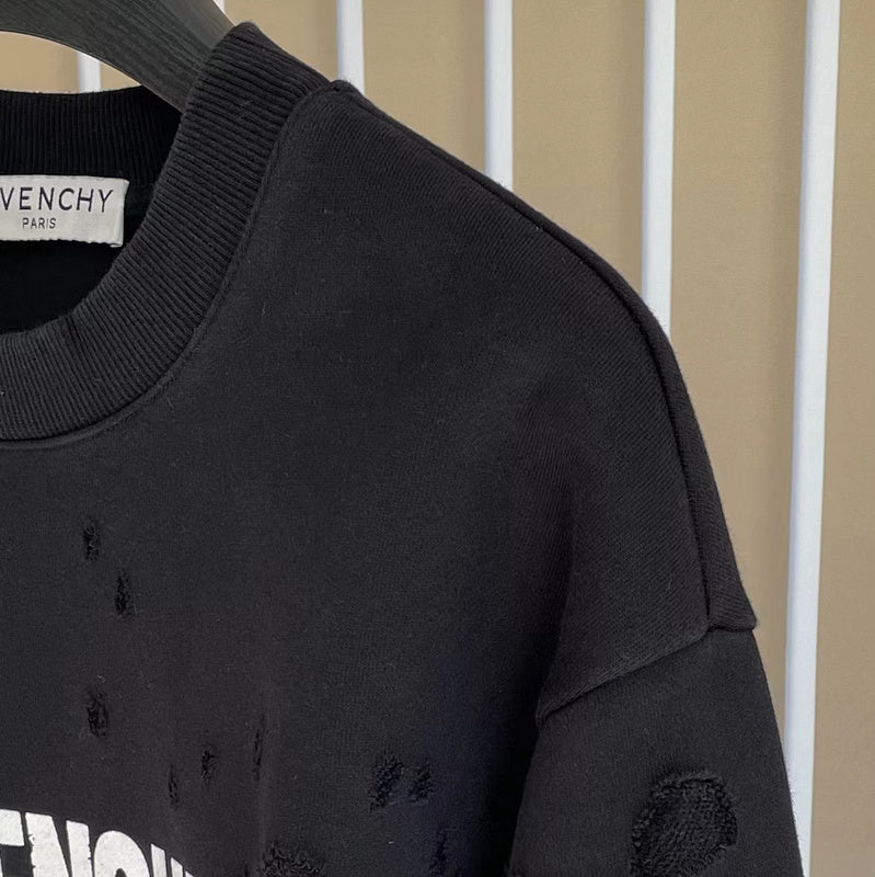 Texture and finish detail of Givenchy luxury piece style No.107