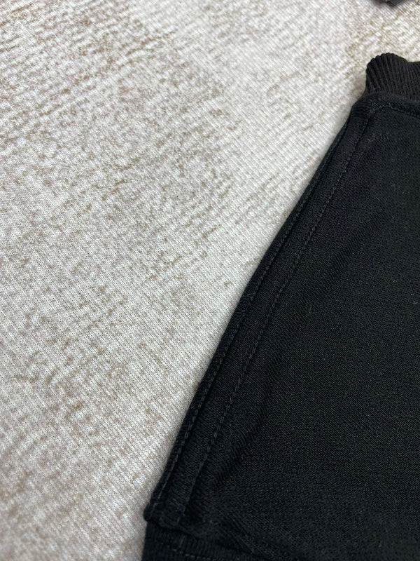 Side profile view of Amiri luxury piece style No.056