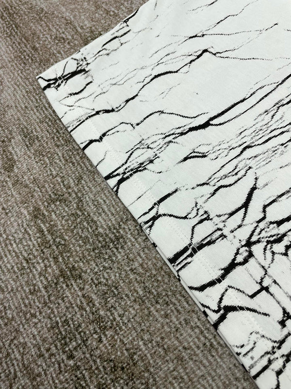 Close-up detail view of Amiri luxury piece style No.127