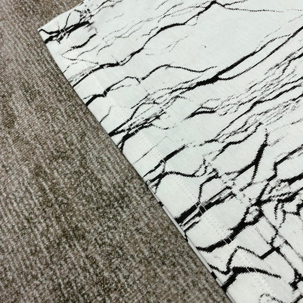 Close-up detail view of Amiri luxury piece style No.127