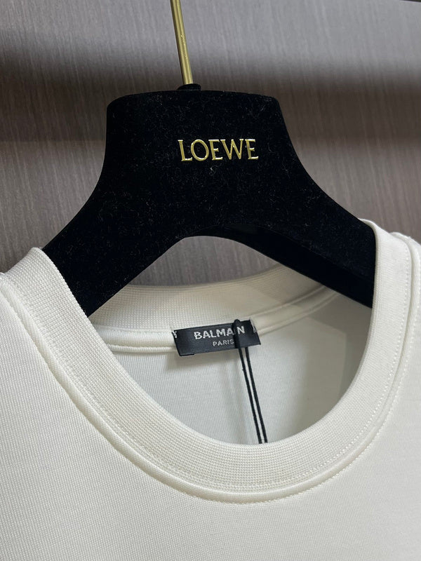 Texture and finish detail of Balmain luxury piece style No.055