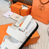 Hermès Black Crisscross Strap Sandals - Close-Up Texture View