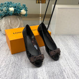 Louis Vuitton shoes Style 416 - close-up of statement logo accent