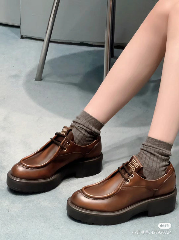 Three-quarter angle view of Miu Miu luxury piece style No.118