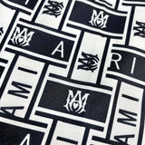 Three-quarter angle view of Amiri luxury piece style No.086