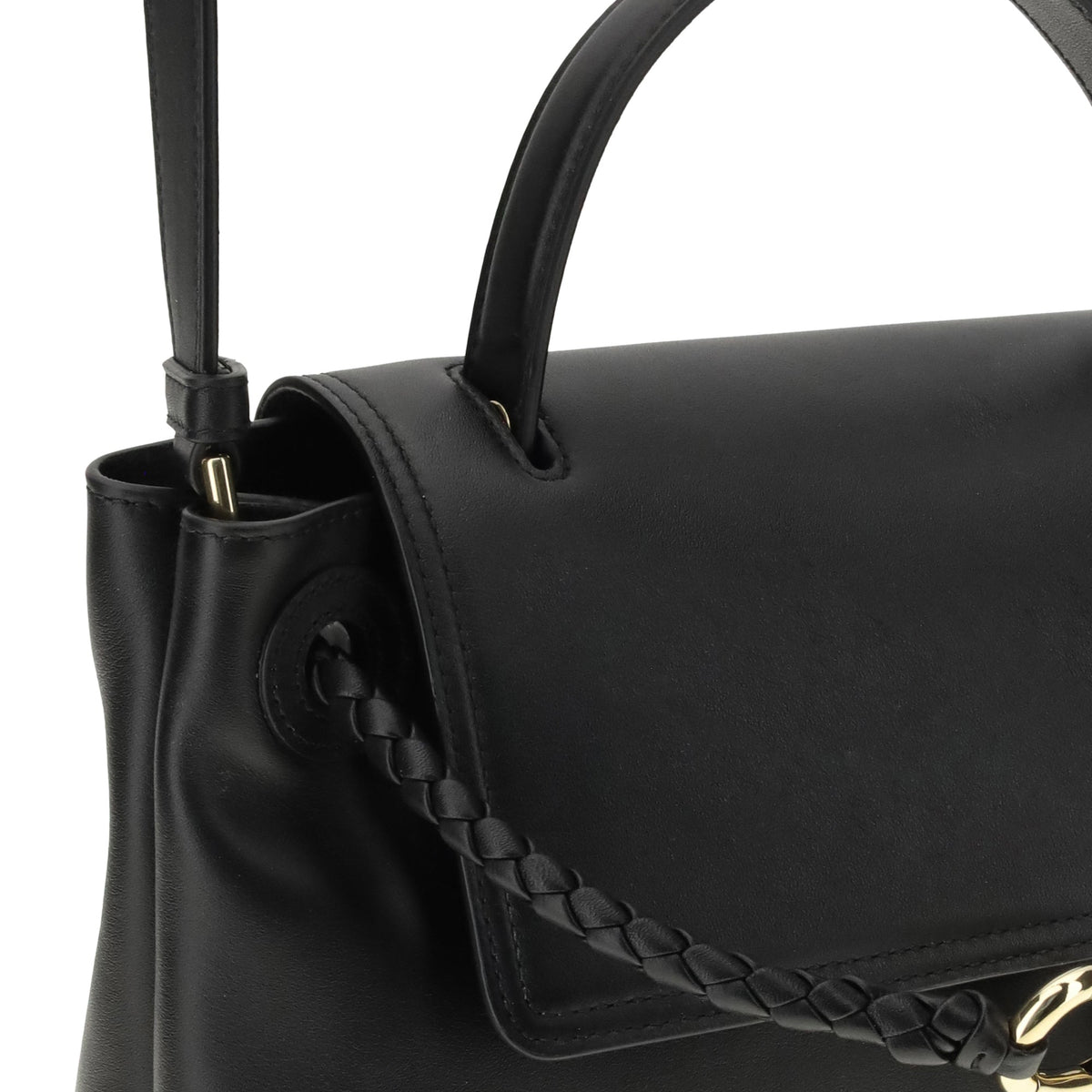 Close-up of Bottega Veneta shoulder bags hardware and fine stitching