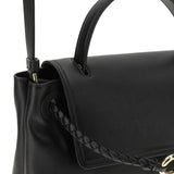 Close-up of Bottega Veneta shoulder bags hardware and fine stitching