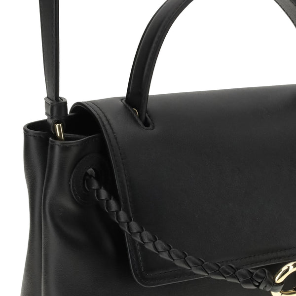 Close-up of Bottega Veneta shoulder bags hardware and fine stitching
