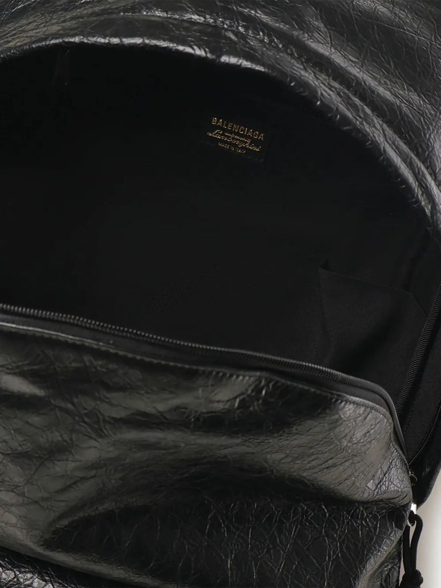 Close-up of Balenciaga backpacks hardware and fine stitching