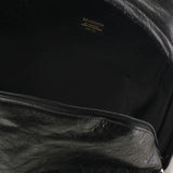 Close-up of Balenciaga backpacks hardware and fine stitching