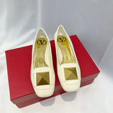 Side profile view of Valentino Garavani luxury piece style No.221