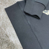 Three-quarter angle view of Amiri luxury piece style No.057