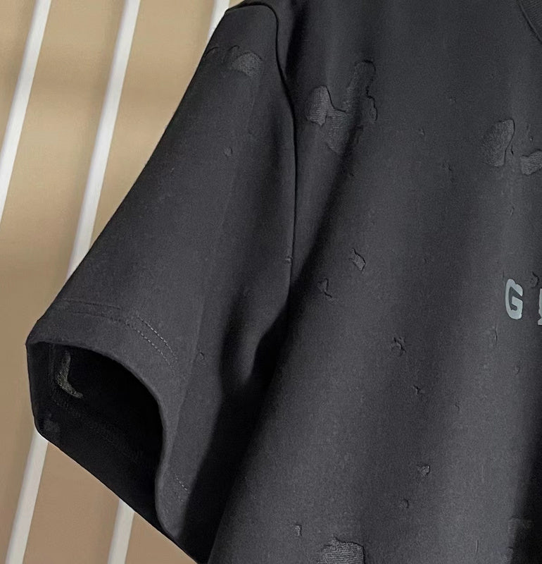 Texture and finish detail of Givenchy luxury piece style No.227