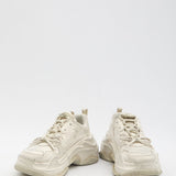 Close-up of Balenciaga sneakers hardware and fine stitching