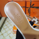 Hermes sandals Style 049 - logo and branding close-up
