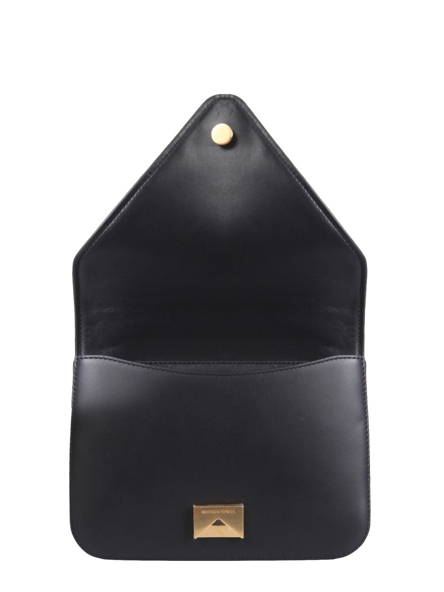 Close-up of Bottega Veneta cross body bags hardware and fine stitching