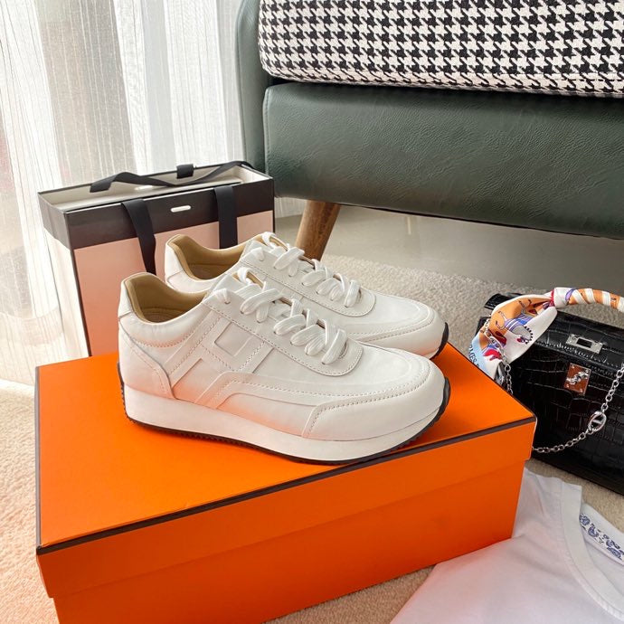 Hermès Beige Loafer Flats - Lifestyle Styling Shot