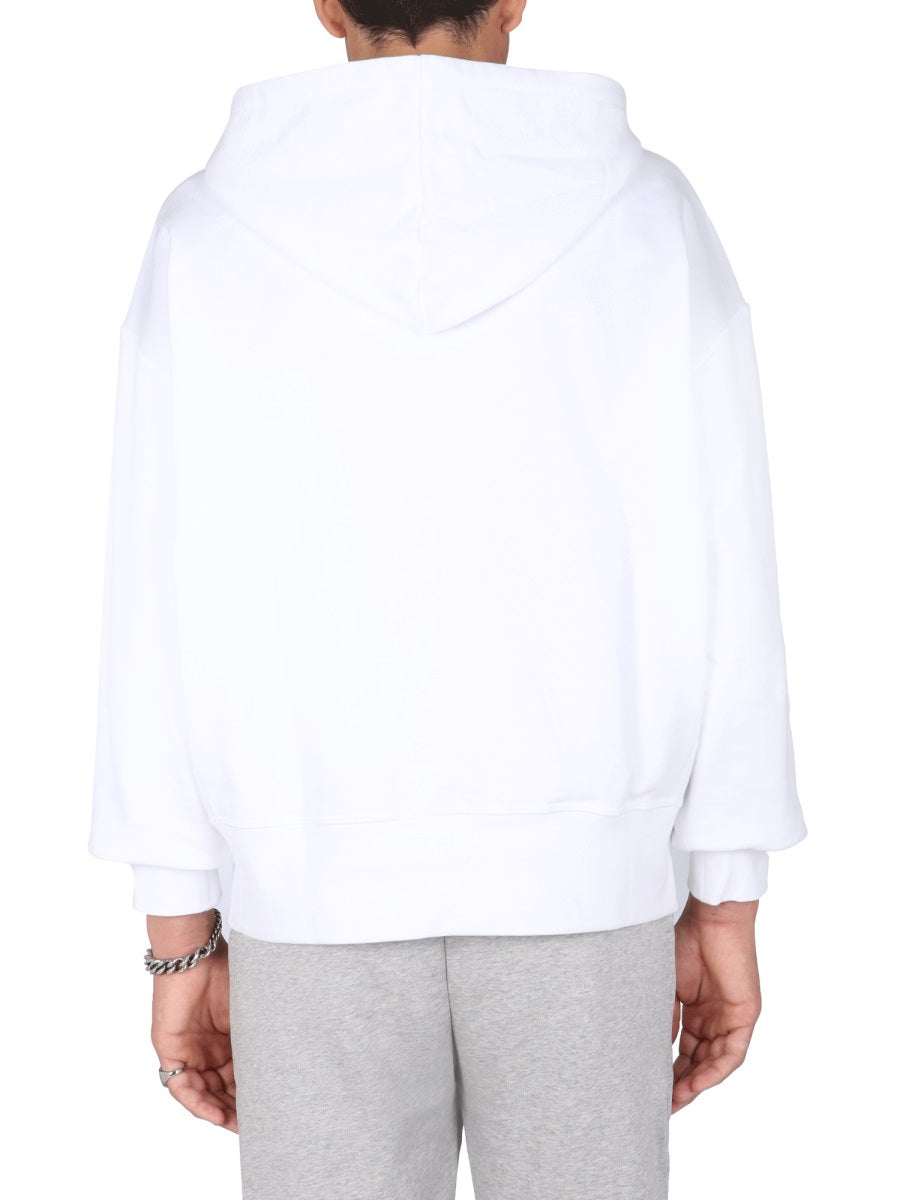 Close-up of Alexander McQueen sweaters & pullovers hardware and fine stitching