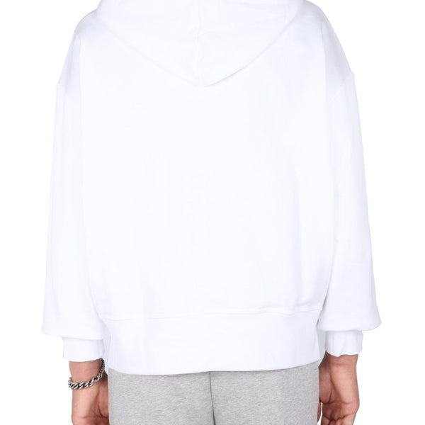 Close-up of Alexander McQueen sweaters & pullovers hardware and fine stitching