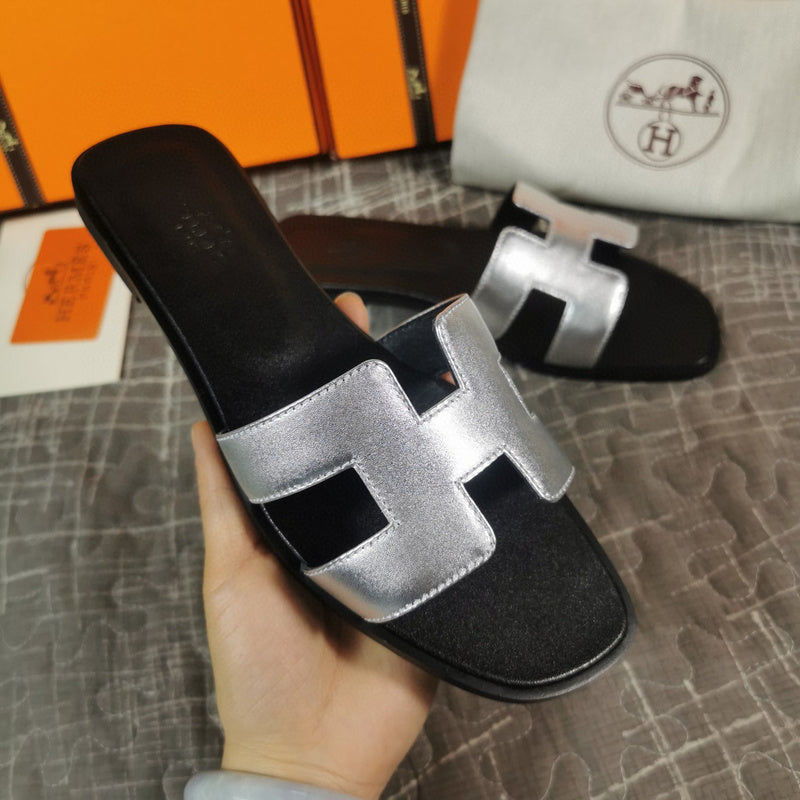 Hermes sandals Style 035 - front view, statement logo accent