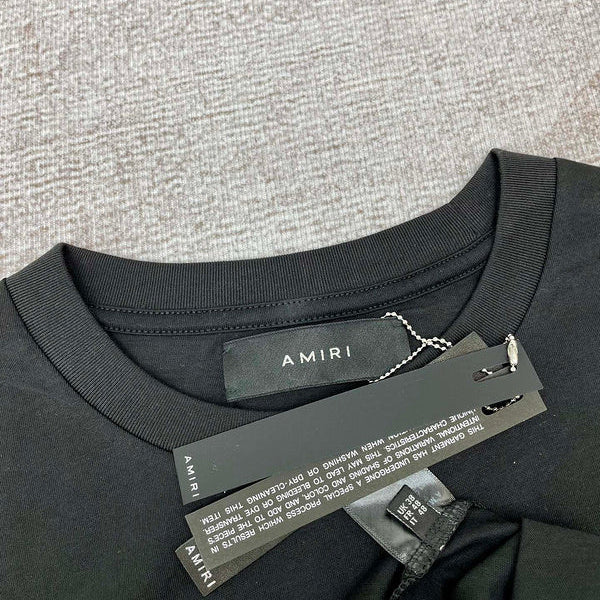 Three-quarter angle view of Amiri luxury piece style No.164