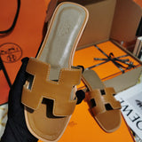 Hermès Red Flat Thong Sandals - Side Profile View