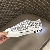 Burberry Burgundy Low-Top Sneakers - Angled View