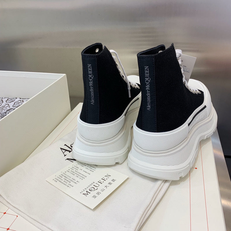 Alexander McQueen White Chunky Platform Sneakers - Close-Up Texture View