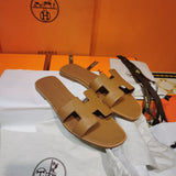 Hermès White Ankle Strap Sandals - Close-Up Texture View