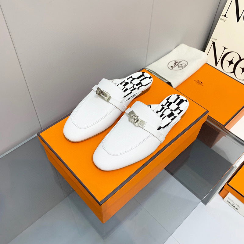 Hermès White Slide Sandals - Sole Detail View