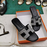 Hermès Beige Gladiator Sandals - Angled View