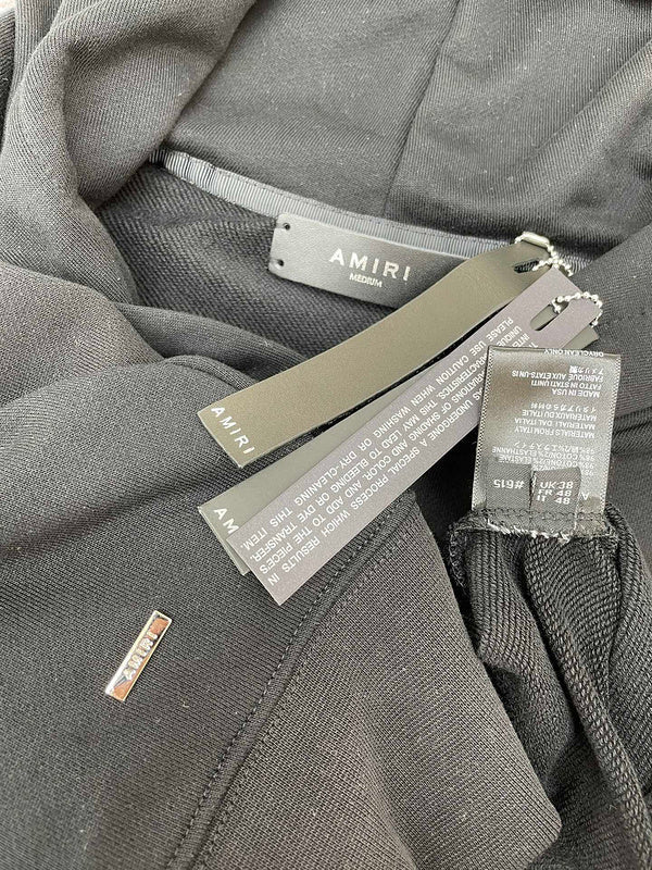Texture and finish detail of Amiri luxury piece style No.084