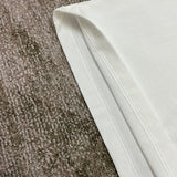 Three-quarter angle view of Amiri luxury piece style No.120