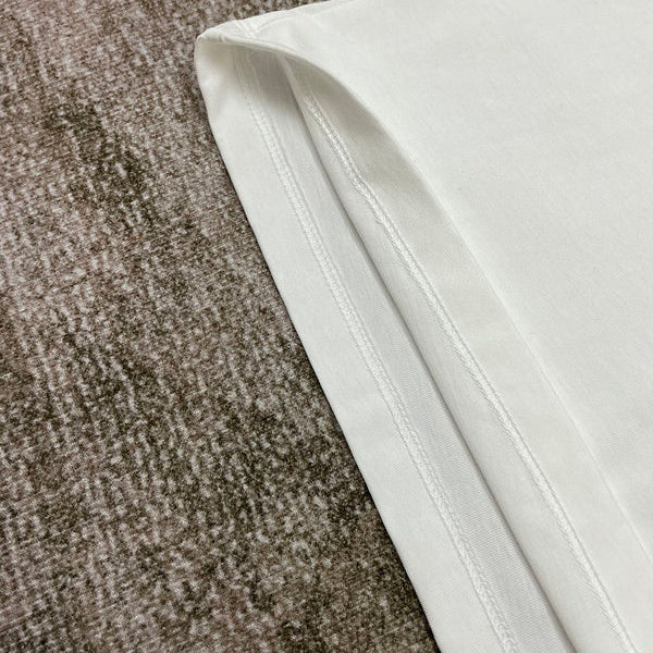 Three-quarter angle view of Amiri luxury piece style No.120