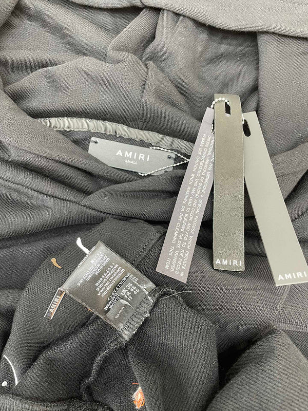 Texture and finish detail of Amiri luxury piece style No.053