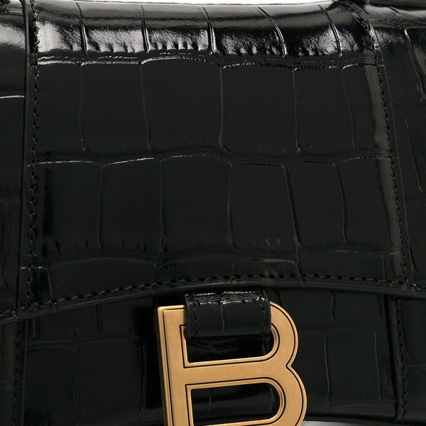 Close-up of Balenciaga handbags hardware and fine stitching