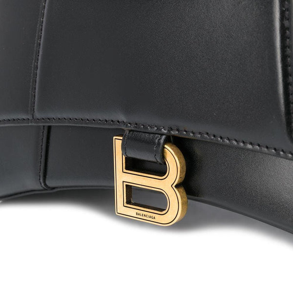 Close-up of Balenciaga handbags hardware and fine stitching