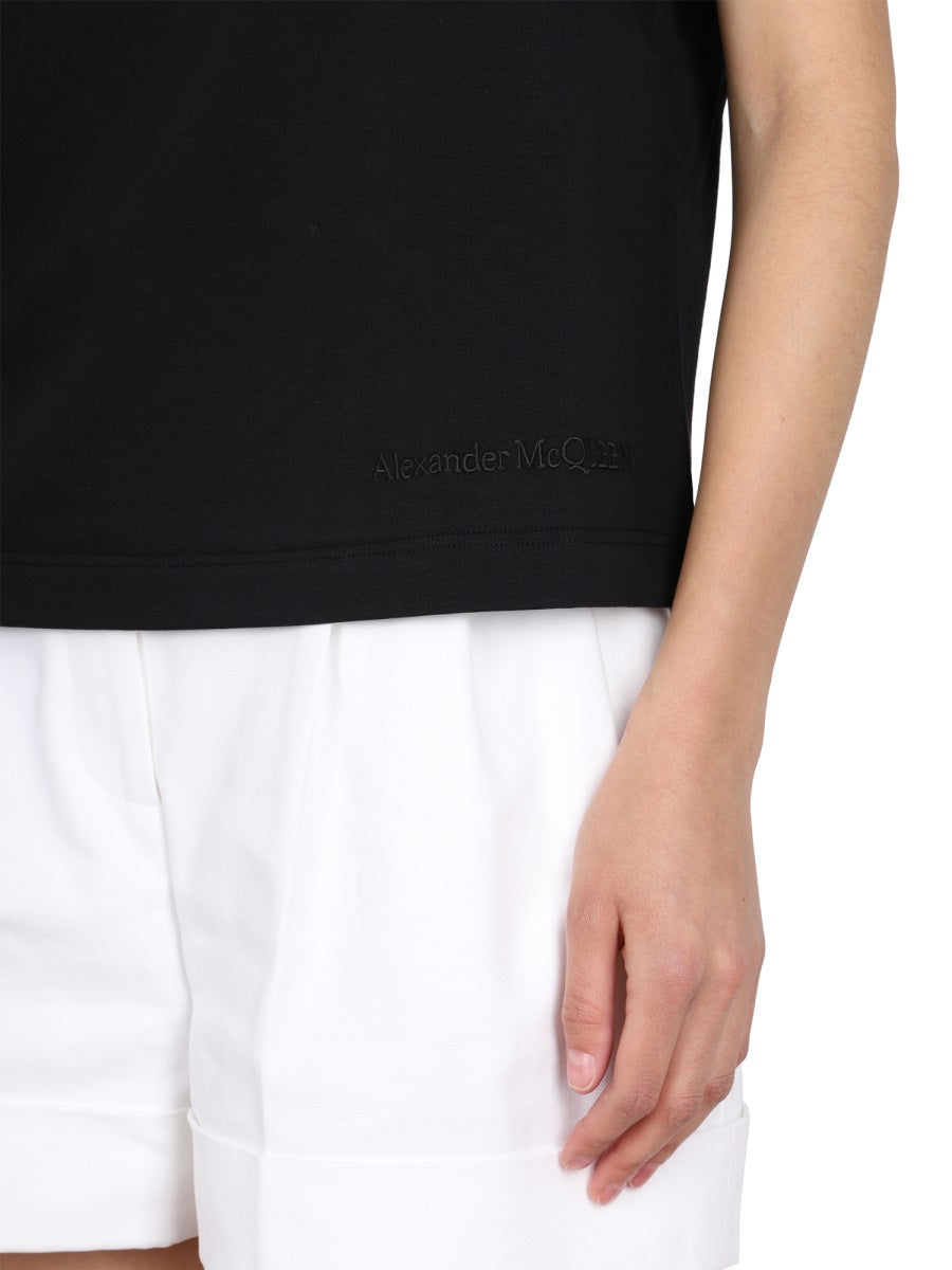 Close-up of Alexander McQueen tee shirts hardware and fine stitching