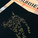 Texture and finish detail of Burberry luxury piece style No.256