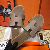 Hermès Grey Crisscross Strap Sandals - Detail Shot of Craftsmanship