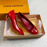 Louis Vuitton Beige Block Heel Pumps - Sole Detail View