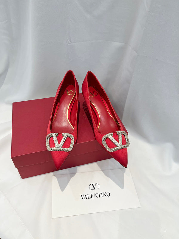 Side profile view of Valentino Garavani luxury piece style No.216