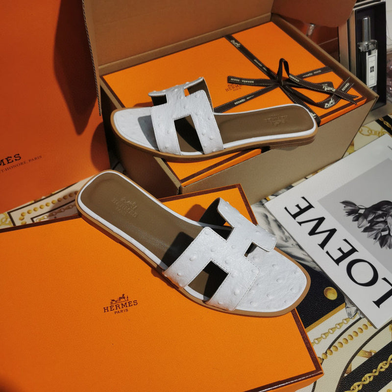 Hermes sandals Style 123 - styled lifestyle view